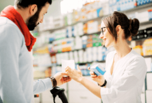 pharmacist with over-the counter drugs